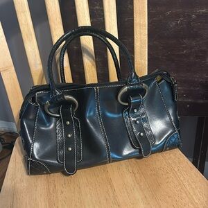 Black Mondani New York shoulder bag purse. Open interior. Exterior pockets